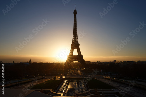 Eiffel Tower and fountains near it at dawn in Paris. © kovalenkovpetr