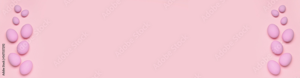 Banner with Easter eggs on pink background with space for text