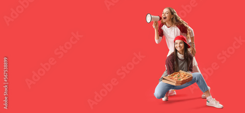 Young women with tasty pizz...