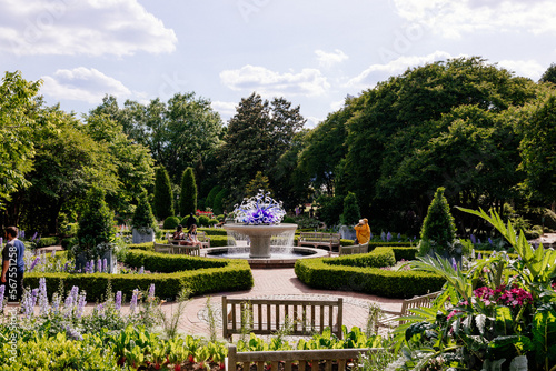 Atlanta botanical garden. Beautiful summer sunny landscape with trees and bushes and fountain in center of composition. 17 May 2021, Atlanta, Georgia, USA