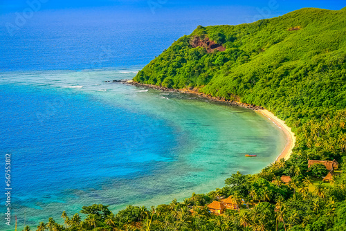 Tropical sandy beach at summer day in Fiji Islands, Pacific ocean