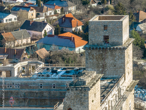 Принти на полотні Closeup aerial view of two square towers being restored in medieval Diosgyor cas