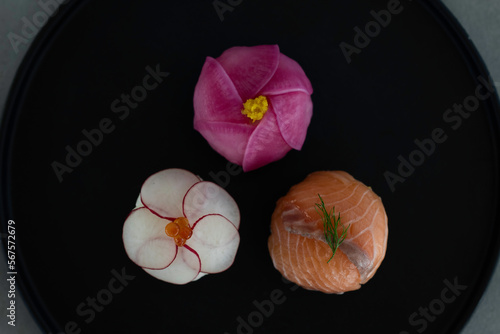 japanese sushi on a black plate