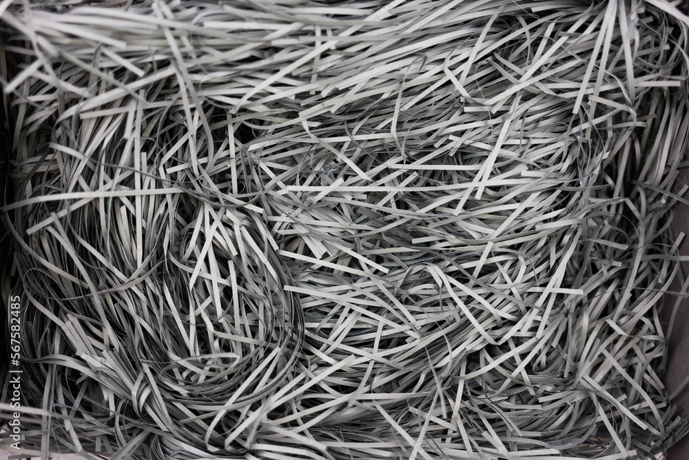 Texture of black shredded paper for gifting and shipping. Top view. Backgrounds and Texture. Texture of black shredded paper for gifting and shipping. Top view. Backgrounds and Texture.
