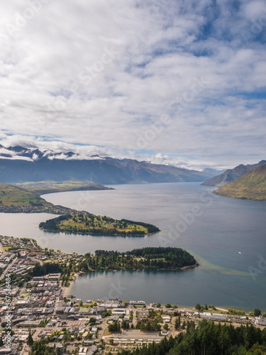 View over Queenstown and Lake Wakatipu on the South Island of New Zealand with the Remarkables mountains in the distance