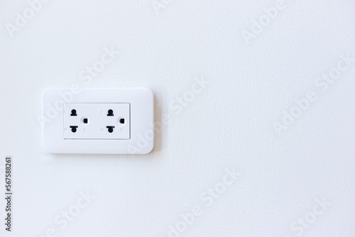 power socket on white wall
