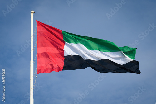 The flag of the United Arab Emirates atop Abu Dhabi's giant flag pole, one of the highest in the world. photo