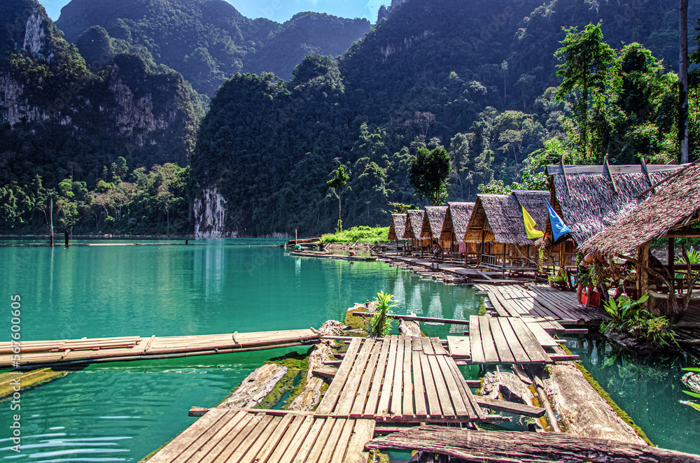 Naklejka premium Ratchaprapha Lake in Thailand with its resort on stilts surrounded by the jungle