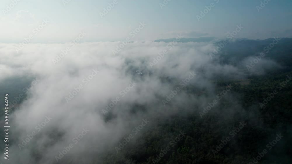Top view Landscape of Morning Mist with Mountain Layer at north of Thailand. mountain ridge and clouds in rural jungle bush forest Top view Landscape of Morning Mist with Mountain Layer at north of Thailand. mountain ridge and clouds in rural jungle bush forest