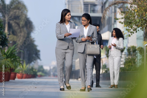 two indian businesswoman decision in outside the office