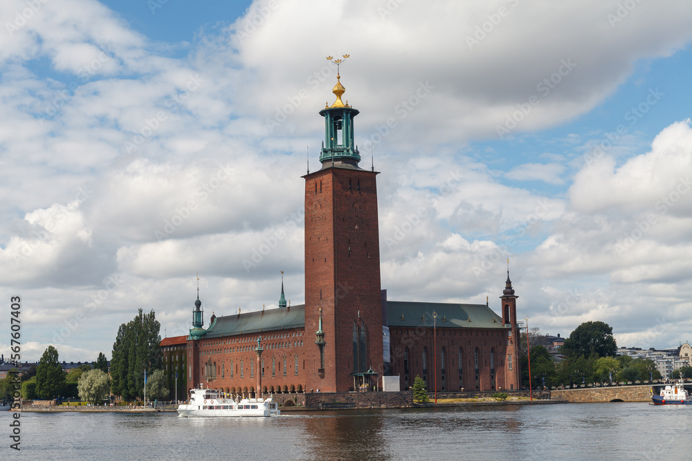 STOCKHOLM, SWEDEN - AUGUST 24, 2022: Scenic view with the City Hall on a beautiful sunny day, Stockholm, Sweden