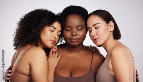 Diversity, feminism and women in a studio for empowerment, girl power and femininity sisterhood. Multiracial, peace and female friends with self love, positive and calm mindset by gray background.