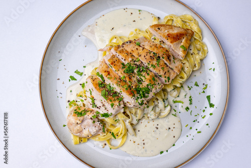 Fettuccine with chicken and cheese sauce
