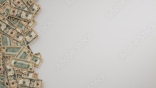 Ten Dollar Bills Border on White Surface. Savings Wallpaper with copy-space.
