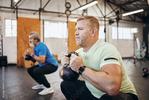 Men, exercise and gym with dumbbells for health and wellness for retirement fitness and energy. Senior or mature people class for squat workout or training for strong body muscle and goals motivation