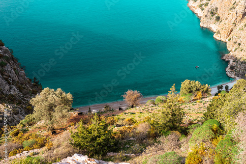 Top view of clear beach and transparent sea of Butterfly Valley. one of the most beautiful beaches in Turkey.