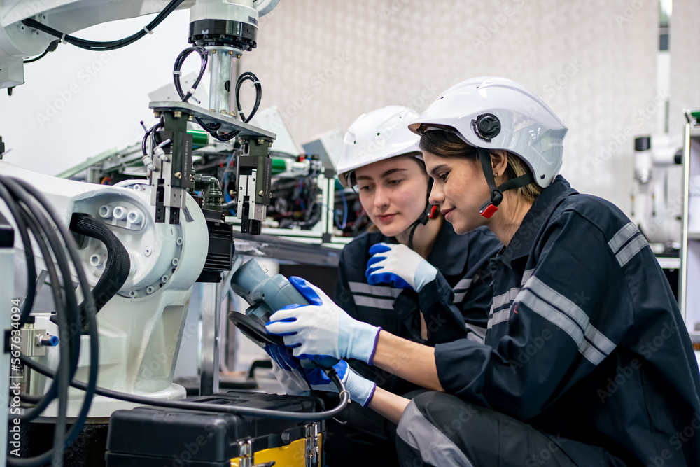 Quality control worker analyzing machine part in laboratory. Quality control worker analyzing machine part in laboratory.