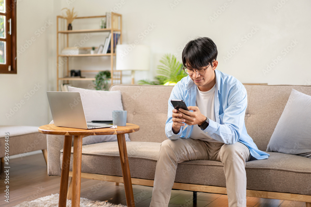 Businessman in casual is sitting on comfortable sofa and chattin