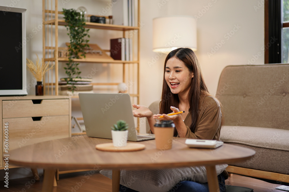 Female entrepreneur working and video conference with colleague Female entrepreneur working and video conference with colleague