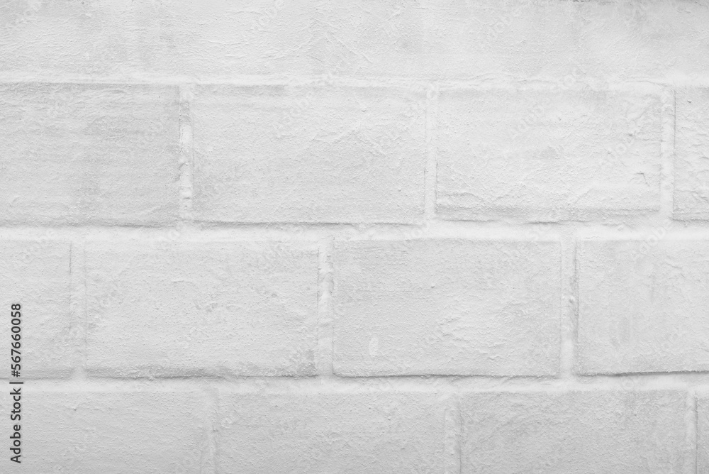 White brick wall in the foreground. Background, texture. White brick wall in the foreground. Background, texture.