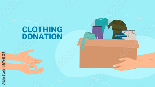 people giving a donation box with clothes for charity and solidarity.