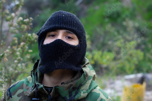 young hooded soldier in jungle,militar en la jungla en matorrales  © jesusdaniel