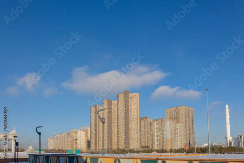 Modern residential buildings on sunny winter day, Nur-Sultan, Astana, Kazakhstan. High quality photo