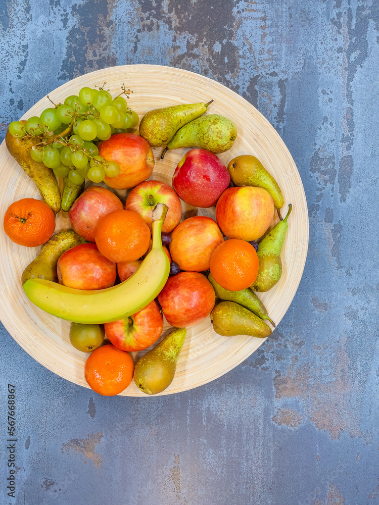 fruits plate with fresh grapes, pears, apples fruits plate with fresh grapes, pears, apples