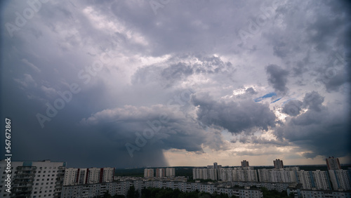 Thunderstorm with downbursts over the city © vasvormich