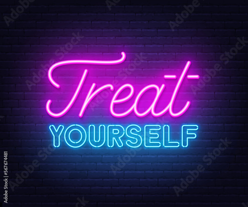 Treat Yourself neon quote on brick wall background.