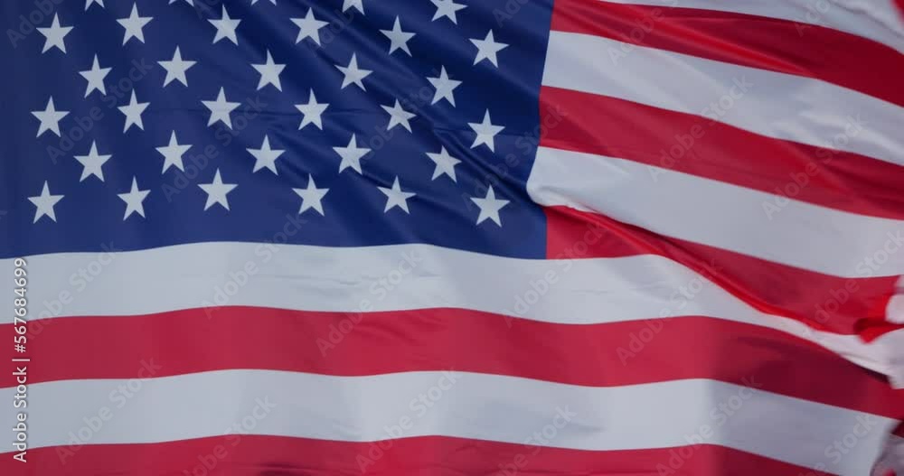 The national USA flag waving in the wind. The national USA flag waving in the wind.