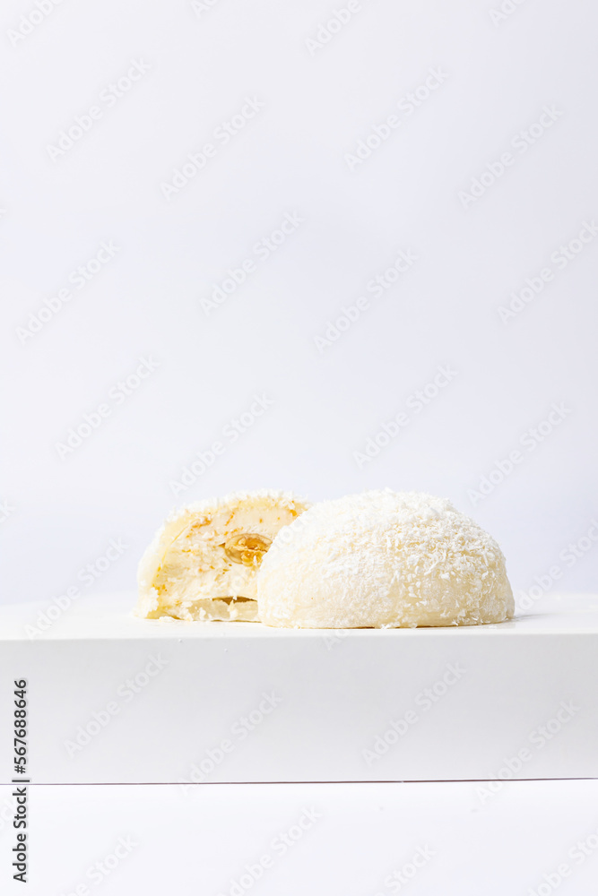 Delicious mochi on a white background, close-up. Traditional Japanese dessert
Delicious mochi on a white background, close-up. Traditional Japanese dessert
