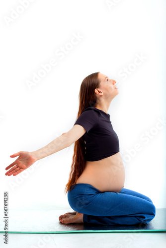 Stage of pregnancy. pregnant woman training yoga