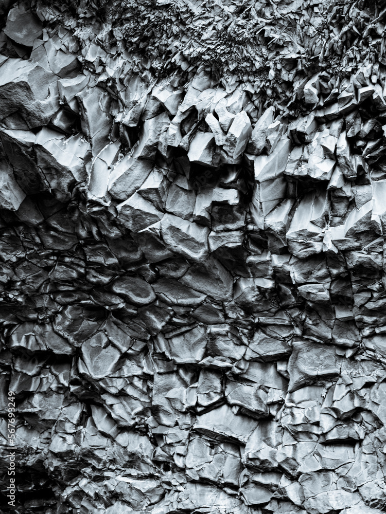 A study in contrasts, a close-up of a mountain wall's edge reveals the intricate patterns carved by the wind into the timeless stone A study in contrasts, a close-up of a mountain wall's edge reveals the intricate patterns carved by the wind into the timeless stone