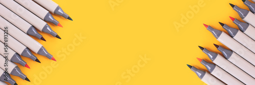 Banner with frame made of felt tip pens on a yellow background. Creative concept with place for text.