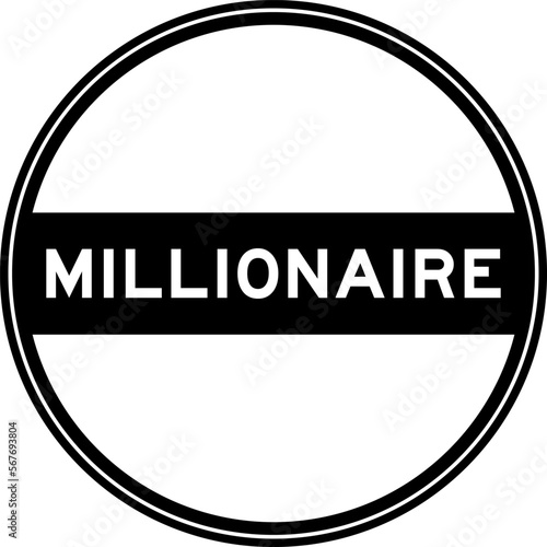 Black color round seal sticker in word millionaire on white background