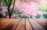 Wood Table with Pink Sakura Flowers Blooming Blossom Blurred Background