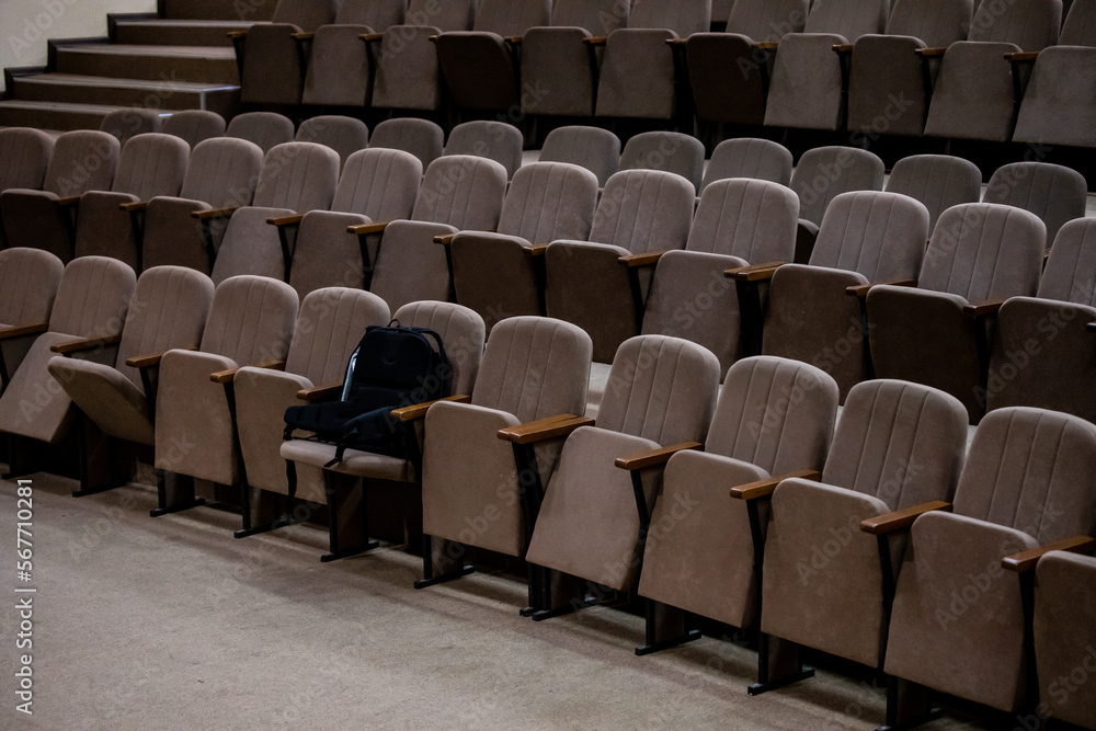 Naklejka premium empty seats in the auditorium in the half-darkness at a live performance.