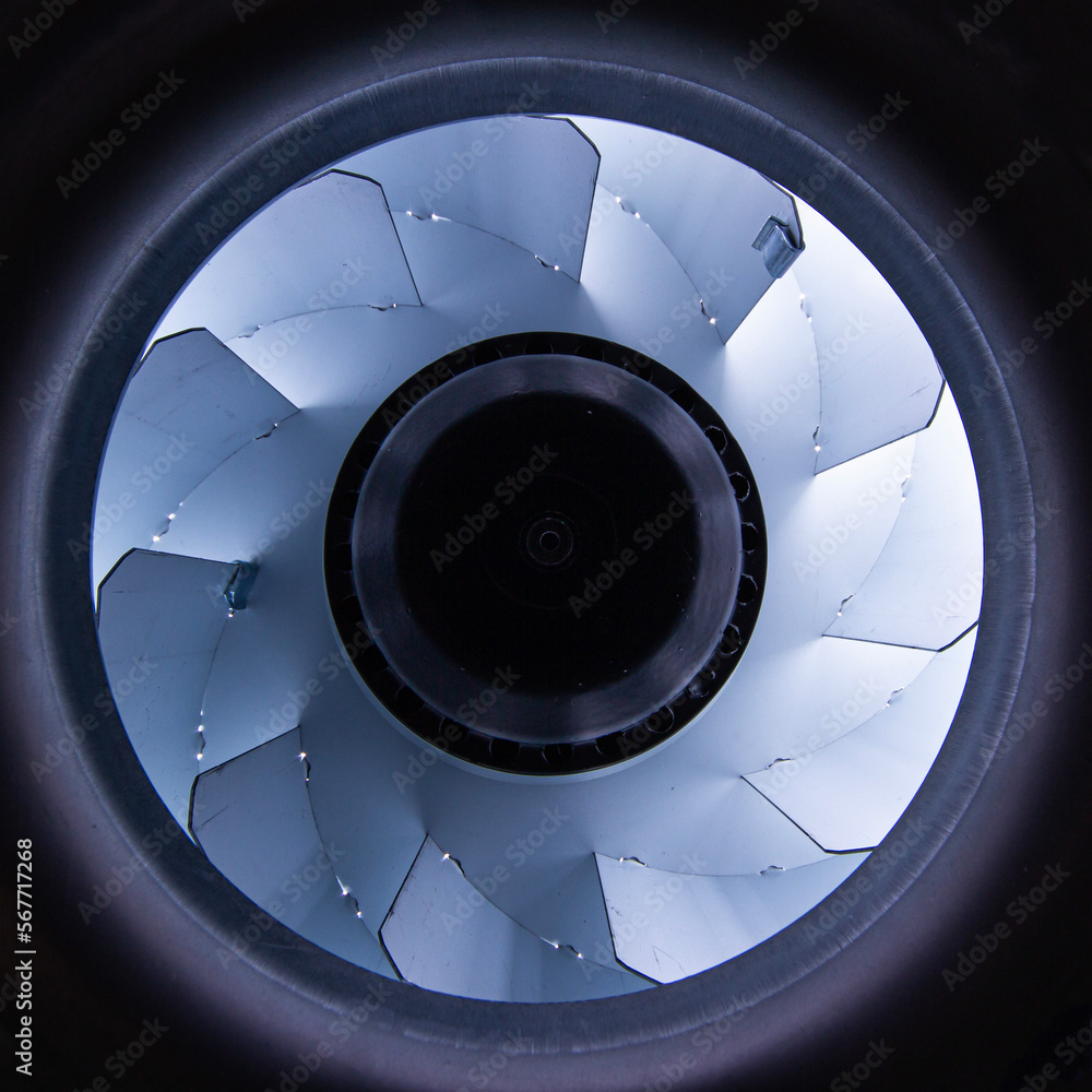 exhaust fan impeller opens up, front and back background blurred with bokeh effect