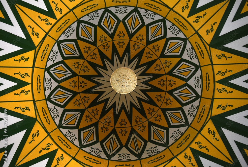 The mosque's ornament is dominated by golden yellow with a beautiful classic style
