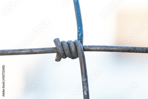 Steel wire fence from the grid with blue polymer coating. Can withstand tensile strength able to receive impact. Knotted Fence. Tensile Mesh wire mesh rust-resistant barbed, thick zinc plated.