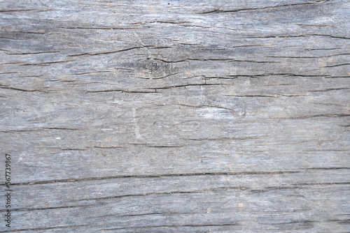 The old wooden floor has cracks.