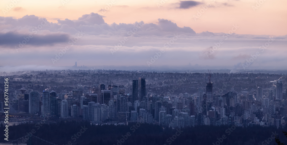 Urban Downtown City and Stanley Park in Vancouver, British Columbia, Canada. Winter Sunrise.
