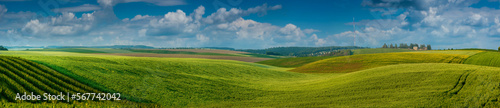Panoramic agricultural landscape. A wonderful rural hills landscape in summer.