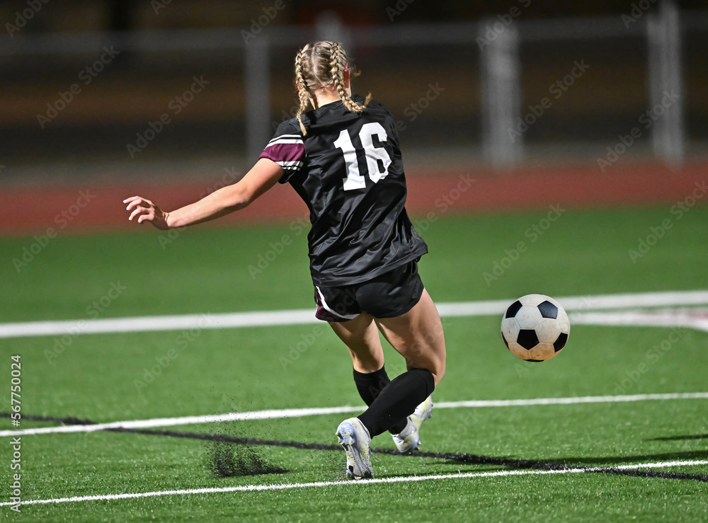 Young kids playing a competitive game of soccer and making great plays Young kids playing a competitive game of soccer and making great plays