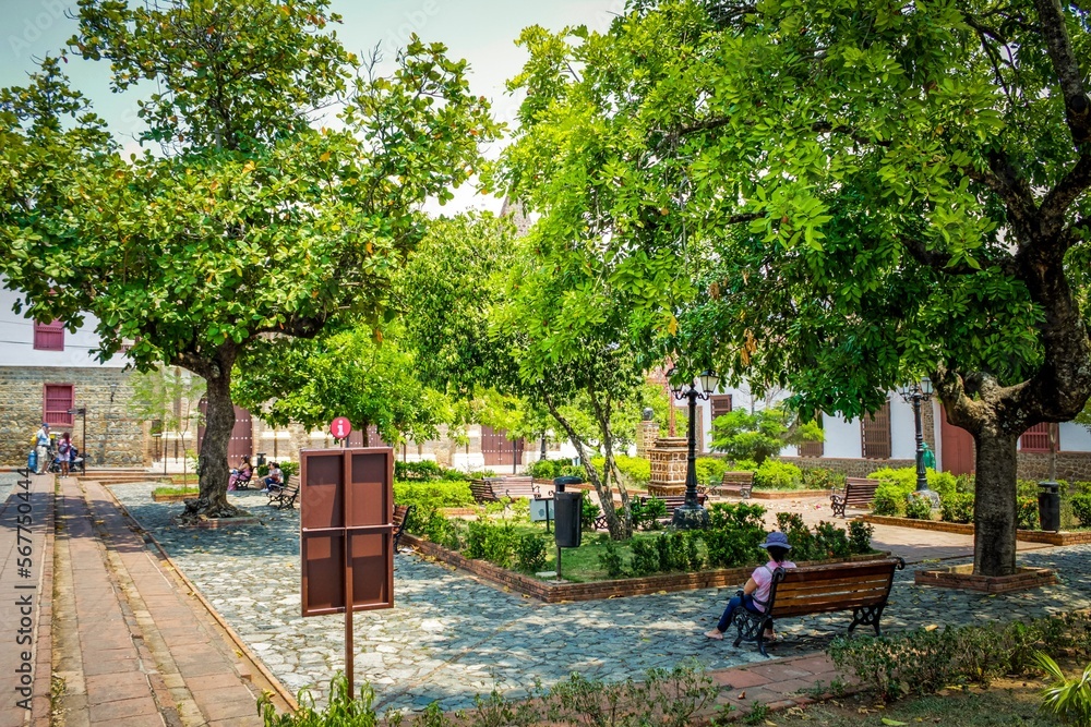 church in the middle of the park of a colonial town