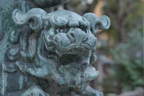 Old and traditional lion stone statue, Stone Lions guardian statue in Namba Yasaka Shrine in Osaka, Japan