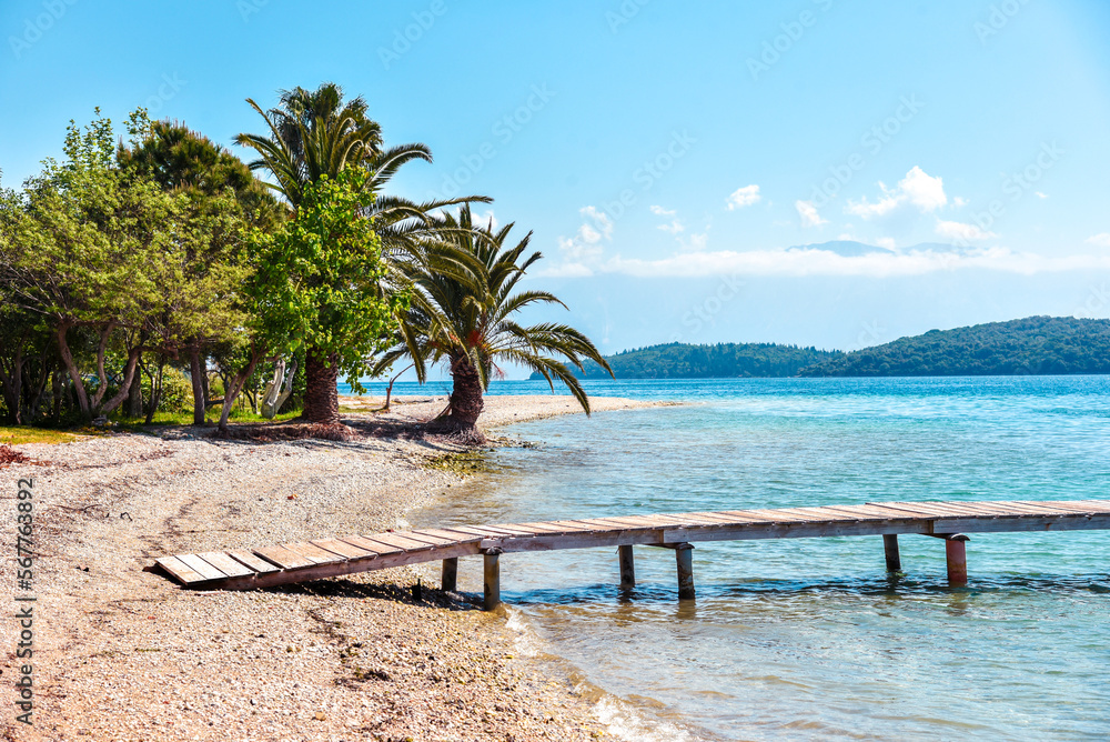 Fascinating optimistic seascape with a wooden pier.