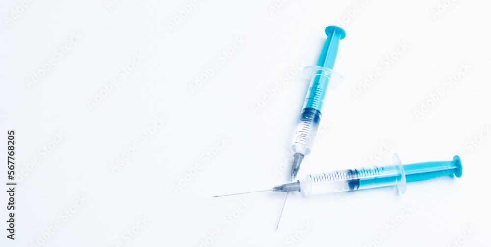 Disposable plastic syringe prepared for injection and vaccination in the hospital. The concept of medicine and health Disposable plastic syringe prepared for injection and vaccination in the hospital. The concept of medicine and health