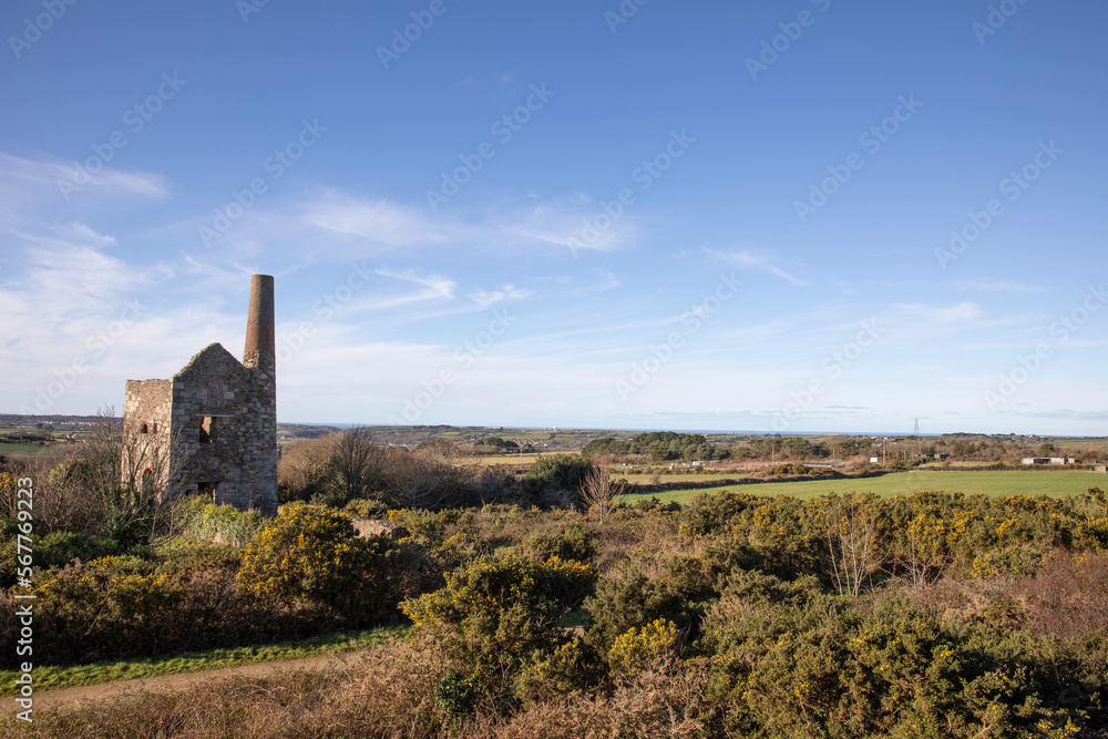The buildings at the site of Wheal Peevor - a tin mine in Redruth, Cornwall UK.